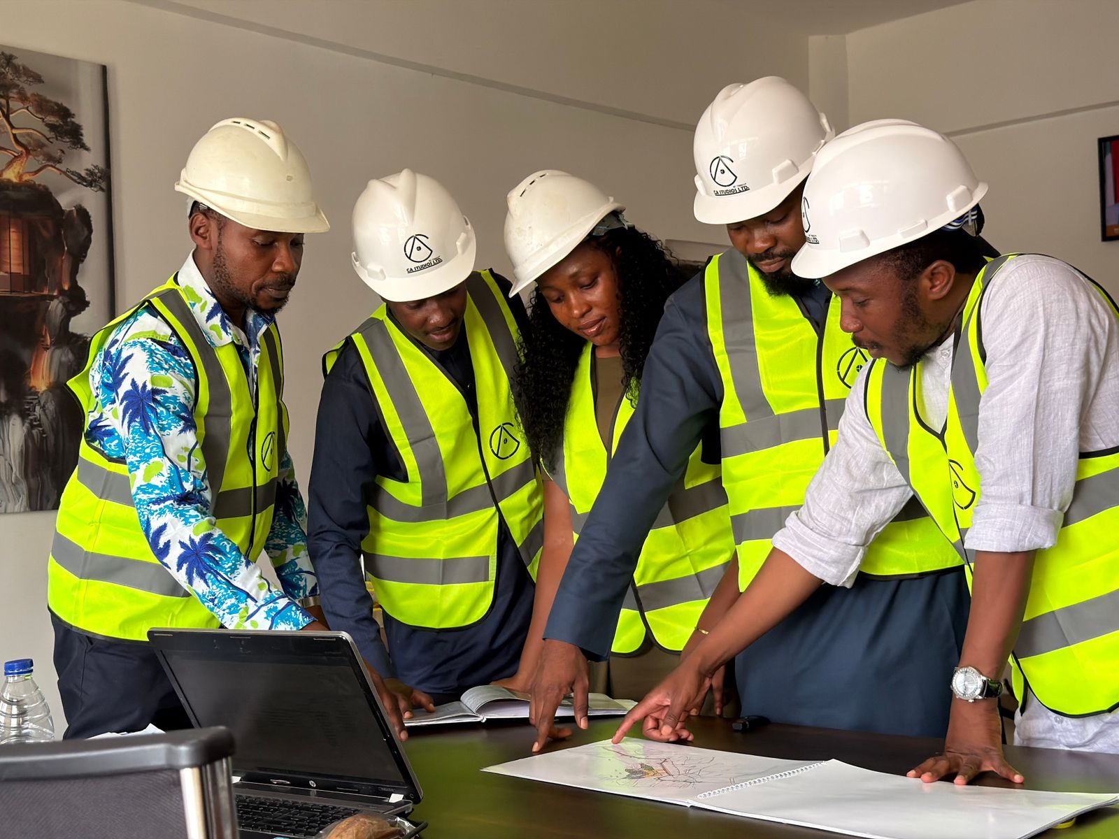 Anchorstone team reviewing project and procurement plans on site